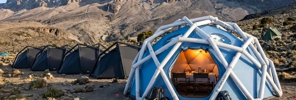 White Mountain Camp dome and sleeping tents beneath Kilimanjaro